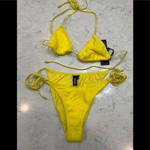 Triangl yellow string bikini.